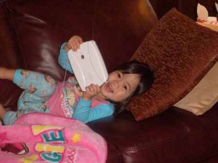 Karis playing with her LeapPad
